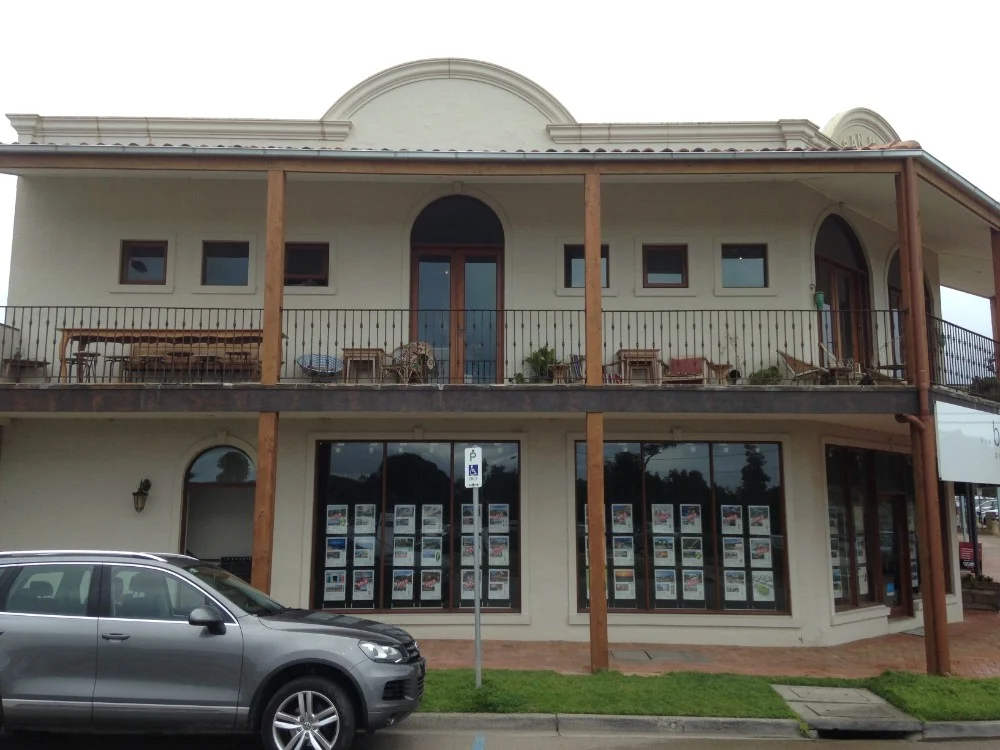 Two-storey facade and balconies
