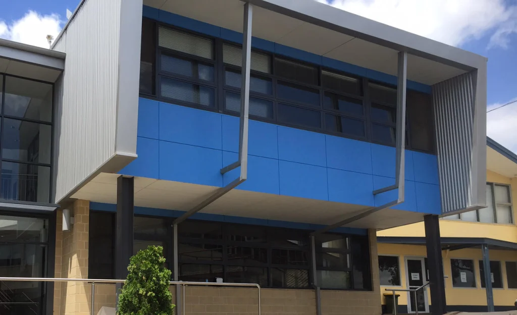 Two-storey commercial building with blue feature panels