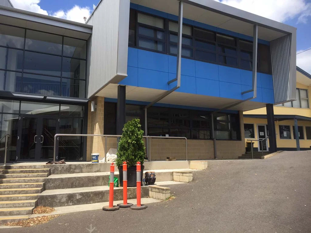 Commercial building entry and stairs after repainting